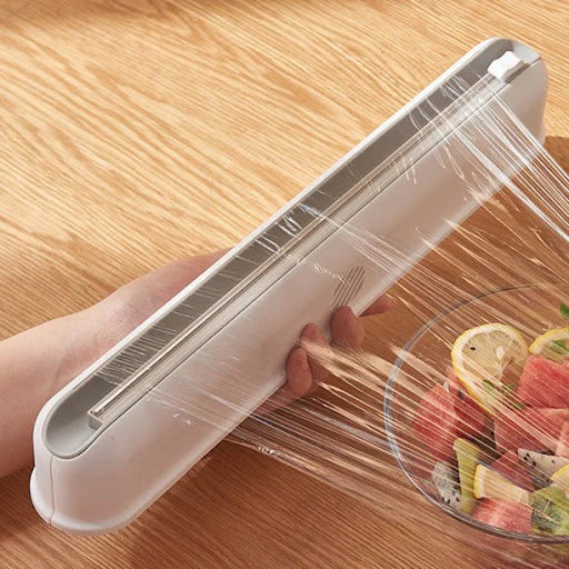 Dispenser folie alimentara stretch, cu ventuze si dispozitiv de taiere
