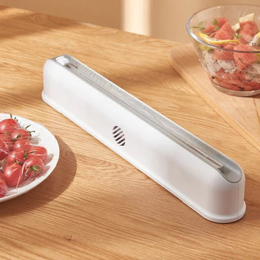 Dispenser folie alimentara stretch, cu ventuze si dispozitiv de taiere