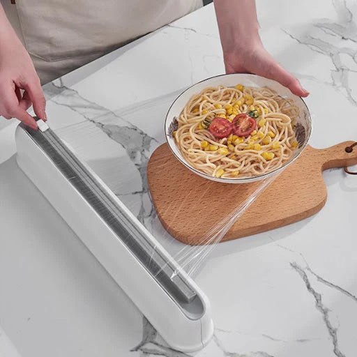 Dispenser folie alimentara stretch, cu ventuze si dispozitiv de taiere